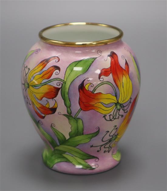 A Moorcroft Enamels miniature vase decorated with stylised fire lilies, boxed, AR initials to base 8cm